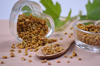 Bee Pollen in a Spoon and Jar