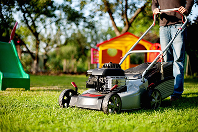 Person Mowing the Lawn